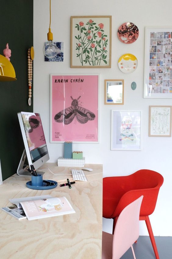a bright gallery wall and colorful chairs will make your home office more inspiring and more spring-like