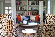 a couple of leopard print chairs here makes the space bold and livley and refresh it a lot, this is a very unusual and bold idea