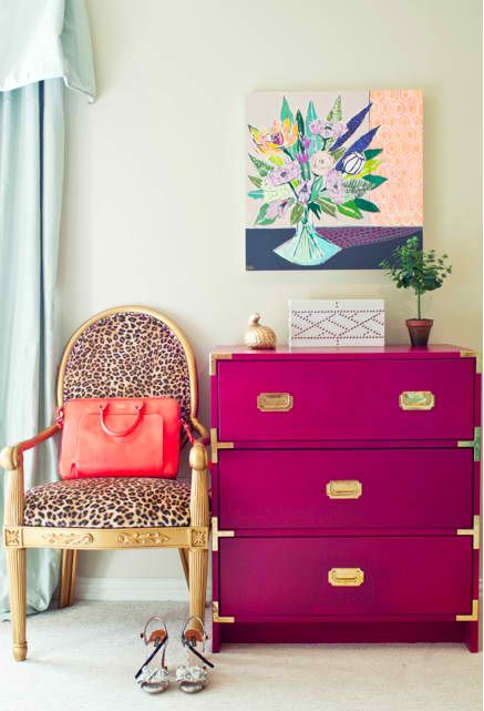 a glam and girlish space with a fuchsia dresser, a leopard print chair, a bold artwork and some cool decor is wow