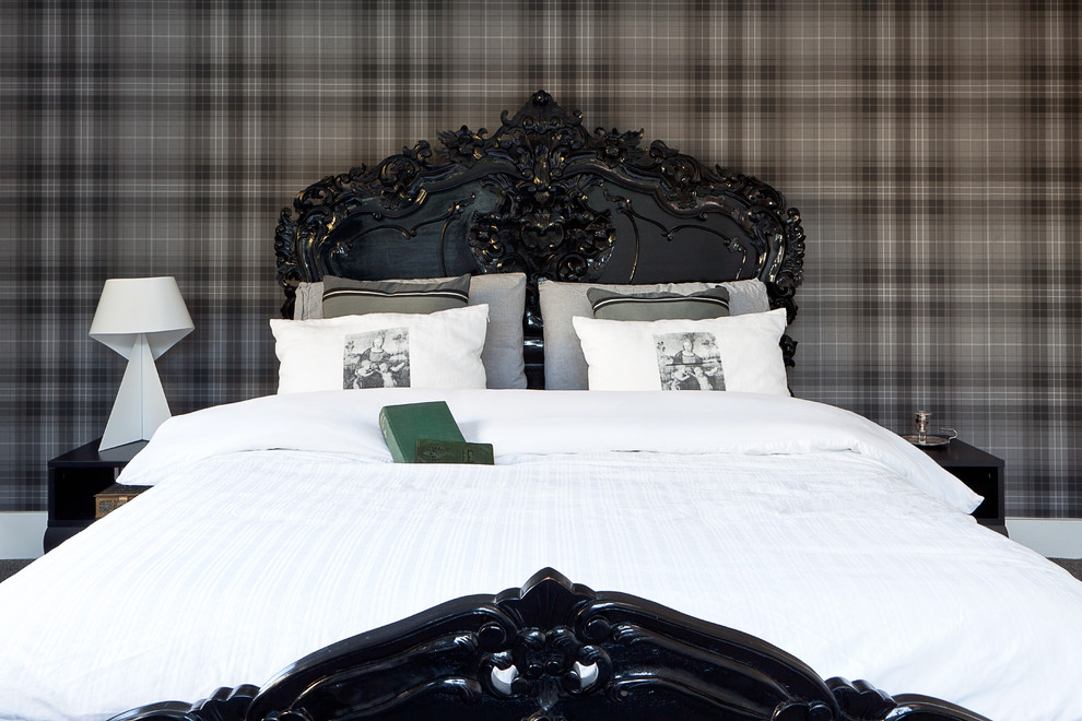 a high gloss black lacquered bed and plaid wallpaper might look quite masculine