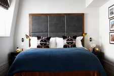 a large upholstered headboard could easily set a tone in a compact bedroom