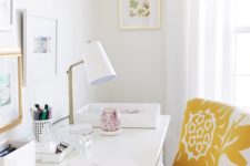 a yellow and white floral chair will add color and print to the spring home office easily