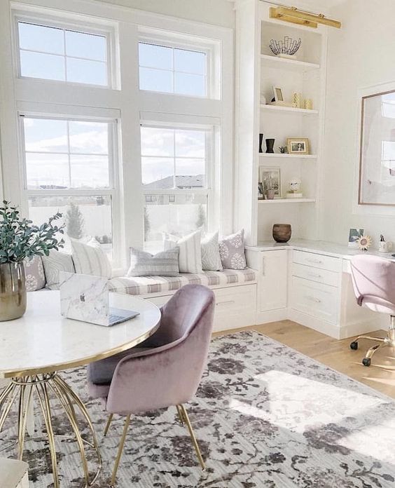 https://www.digsdigs.com/photos/2013/04/an-airy-neutral-home-office-with-lilac-chairs-a-printed-rug-a-windowsill-daybed-and-storage-units.jpg