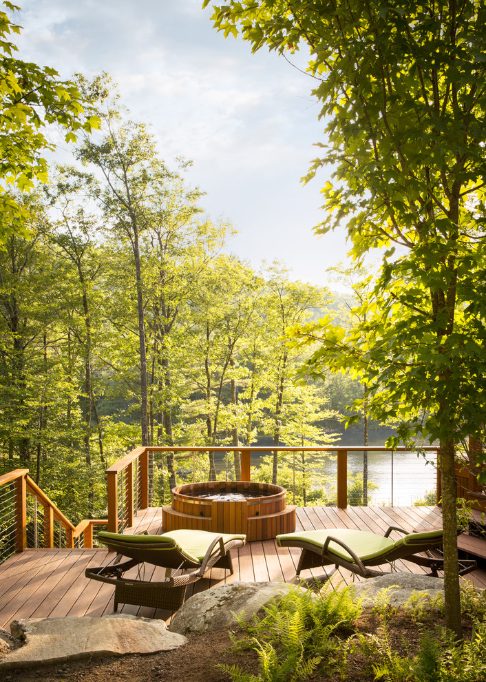 A wooden two-storey hot tub on a deck is the best choice if you want to enjoy surrounding views. (Leslie Saul &amp; Associates)