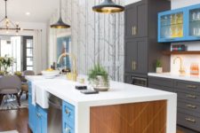 a bright blue and plywood kitchen island with a white countertop plus drawers for storage and appliances