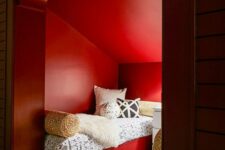 a bold red guest bedroom