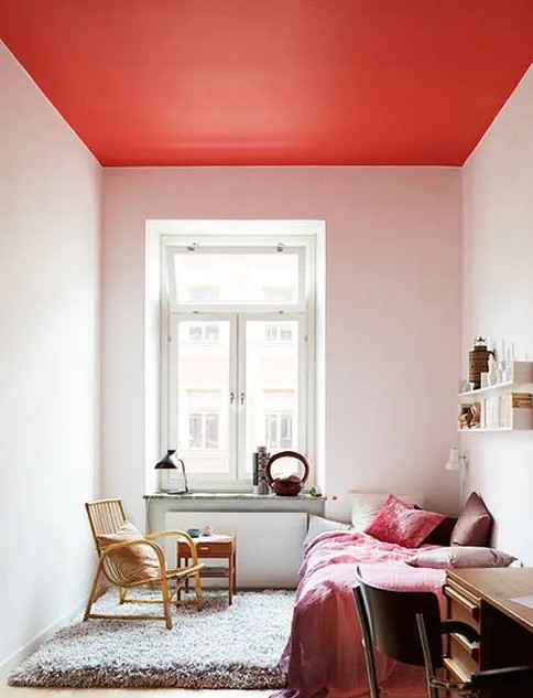 a red ceiling is a unique and bold decor feature that adds color in a non-typical way