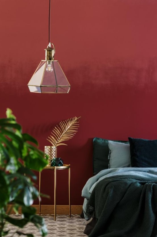 a bedroom with red walls