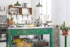 a vintage kitchen with open shelves instead of cabinets, stainless steel appliances, a green kitchen island of wood