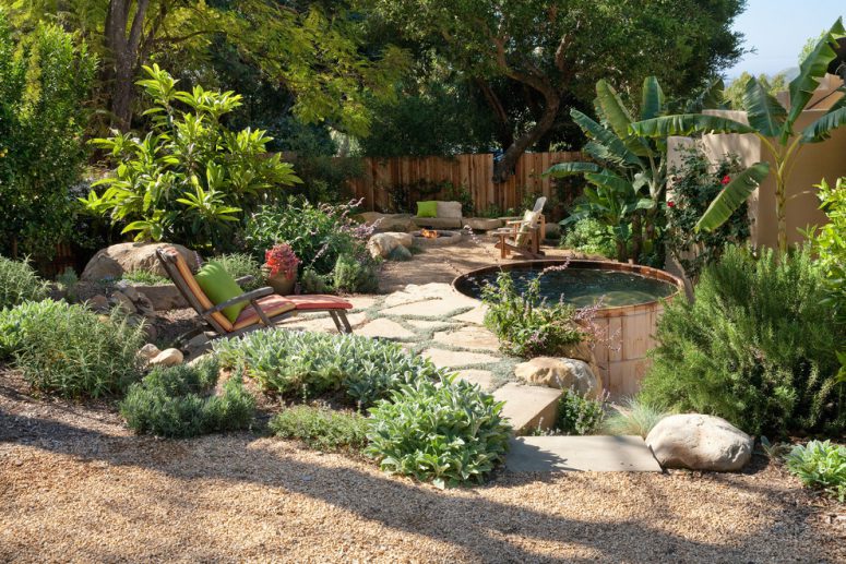 nesting a tub into flagstone patio would make it blend it well