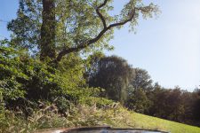 simple wooden tub is the perfect thing to enjoy the scenery