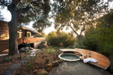 the cool thing in decks that surrounds in-ground tubs is that you can install hidden covers in them