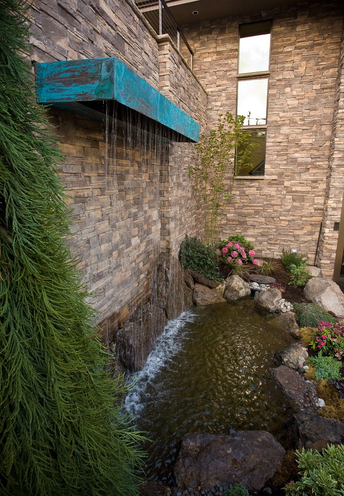 the sound of splahes when water hit stones would be much different from the sound when its hitting water