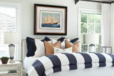 Beach style bedroom with white walls distressed furniture and simple yet cute bedding set