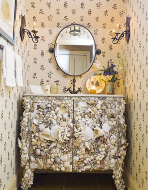 a chic powder room vanity clad with seashells is a lovely idea for a modern beach space is a gorgeous idea