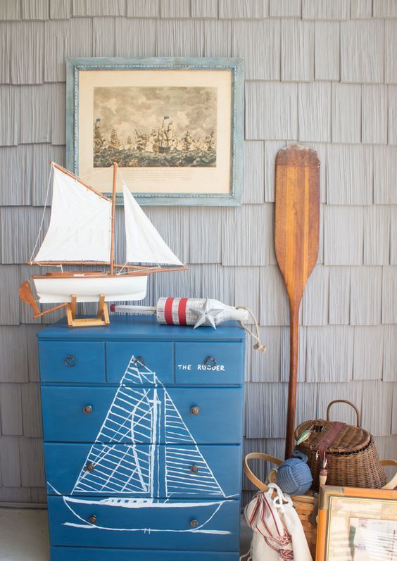 a handpainted maritime dresser is a lovely idea for a coastal or beachy space and can be easily DIYed