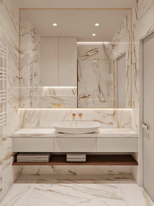 a minimalist bathroom with a mirror wlal, a floating vanity and shelves plus much light