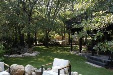 a lovely outdoor space with a fire bowl