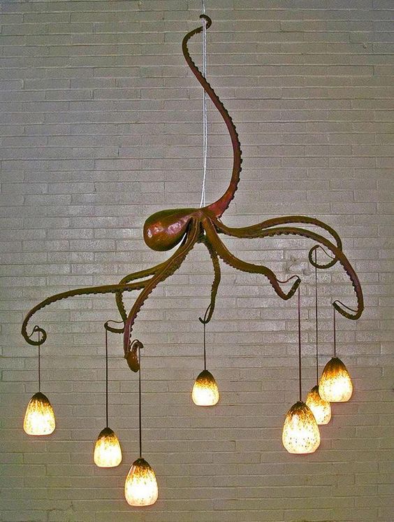 an octopus chandelier is a bold and statement-like idea for any seaside-inspired space and will catch all the eyes