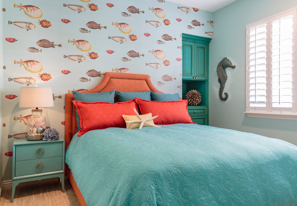 orange and turquoise color theme is perfect for a sea themed kids bedroom