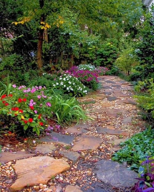 pebbles and rough stones of various shapes and looks create a very natural and relaxed path