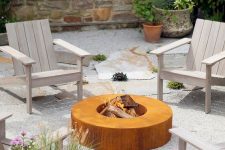 this sleek propane fire pit table is a statement-maker, it will bring ultimate coziness and warmth to your rustic backyard
