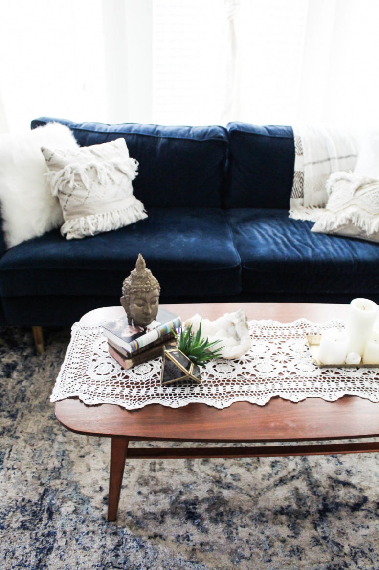 Even some boho coffee table styling would add some charm to any living room.