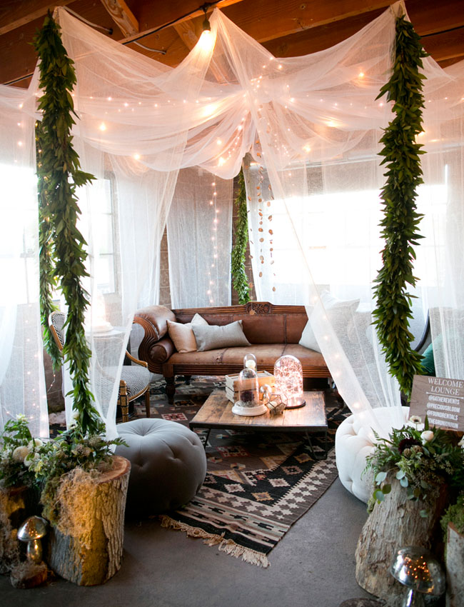 Who said canopies are good only for bohemian bedrooms? They could work in living rooms too.
