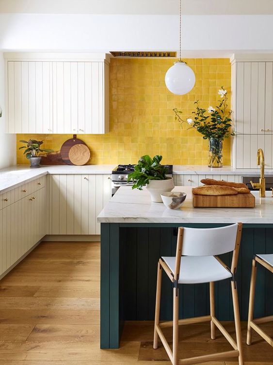 https://www.digsdigs.com/photos/2013/07/a-chic-vintage-inspired-kitchen-with-white-beadboard-cabinets-white-stone-countertops-a-sunny-yellow-tile-backsplash-and-a-hunter-green-kitchen-island.jpg