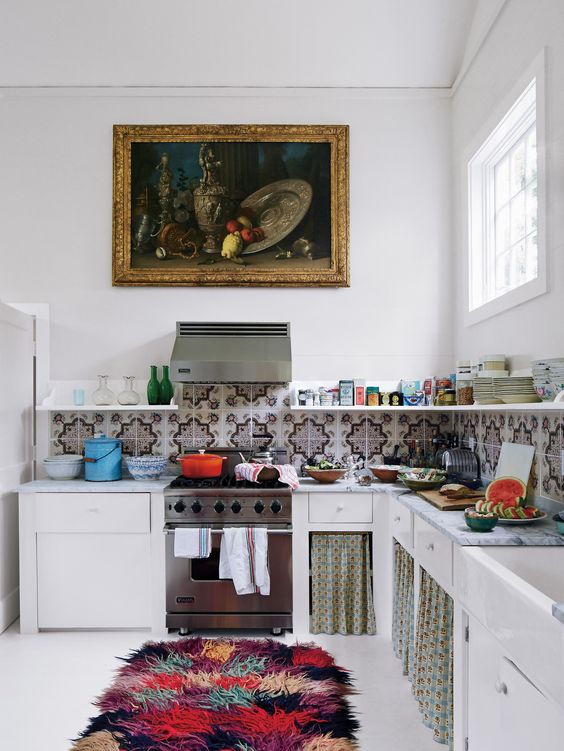 a colorful fluffy rug, a mosaic tile backsplash and some curtains for a boho feel