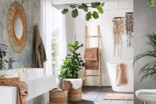 a contemporary meets boho space with potted greenery, baskets, rattan furniture, a wicker mirror and a ladder