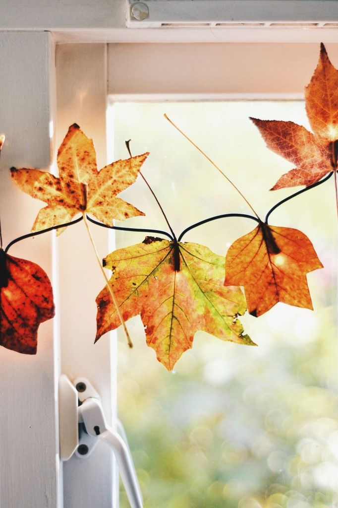 cozy fall staircase decor ideas If you have windows on your staircase you could add some cute leaf fairy lights to them. It's cute and inexpensive idea.