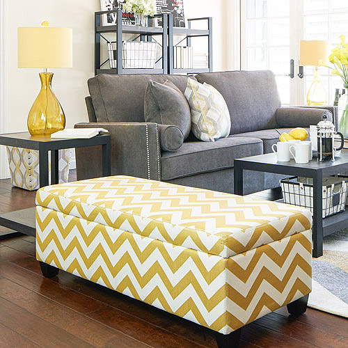Pack three functions in one with a storage ottoman. He can provide a place to sit, a leg rest area and you can stuff lots of stuff inside.