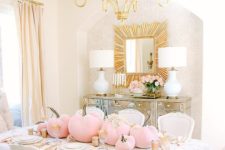 a glam fall tablescape with gold touches and light pink pumpkins and neutral blooms is amazing