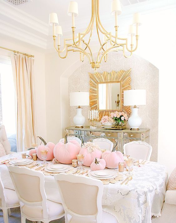 a glam fall tablescape with gold touches and light pink pumpkins and neutral blooms is amazing