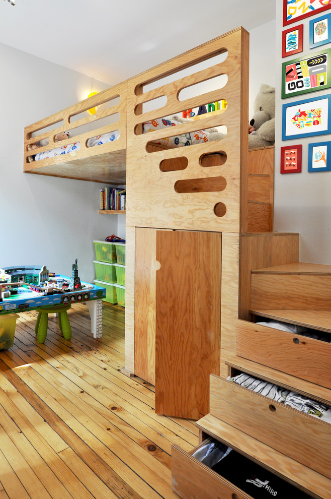 if your ceilings allow you can design a multi-level room with smart stairs storage