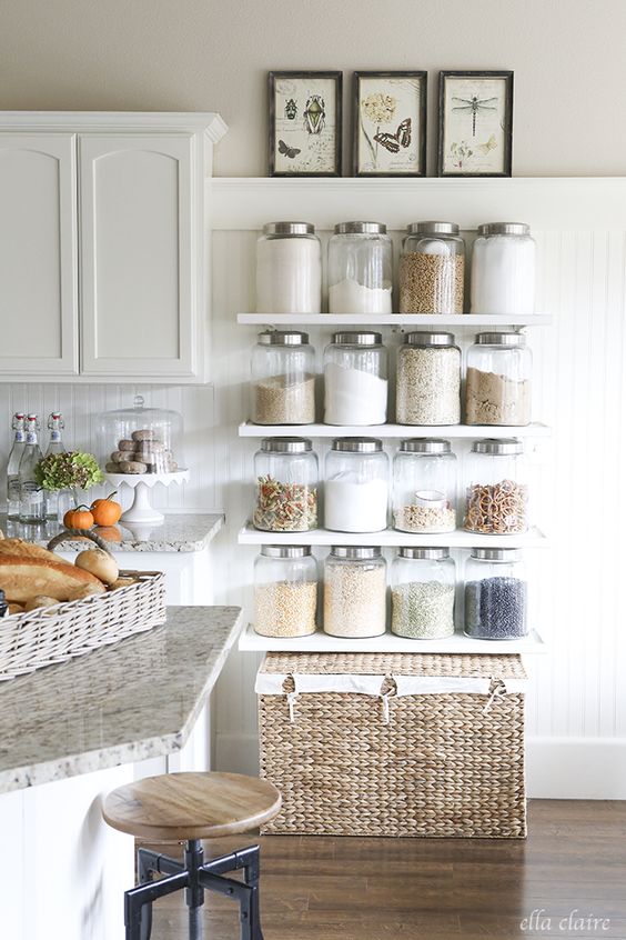 open shelves and a large woven chest are ideal for a modern farmhouse kitchen and provide much storage space