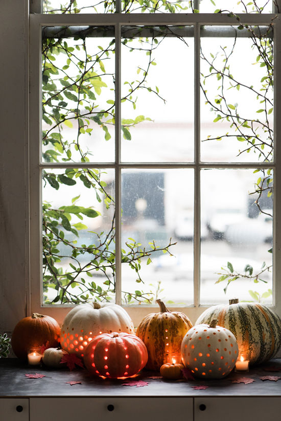 If you drill a bunch of holes in hollow pumpkins and add candles there you'll get yourself very original lanterns for fall's decor.
