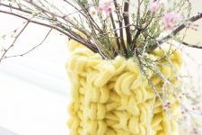 a bold yellow chunky knit cover for a planter or a vase is a great idea to make your planters lovely, not only for the fall