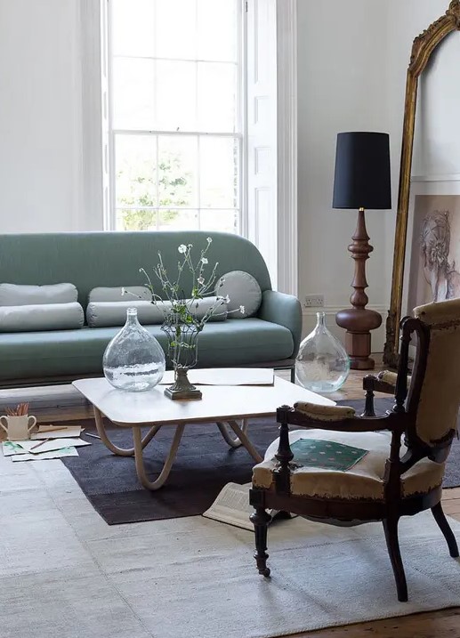 a chic and fun mid-century modern coffee table with a sleek tabletop and creative hairpin legs is a lovely idea for a mid-century modern space