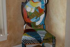 a colorful chair inspired by Picasso paintings is a great idea for an art-lover space