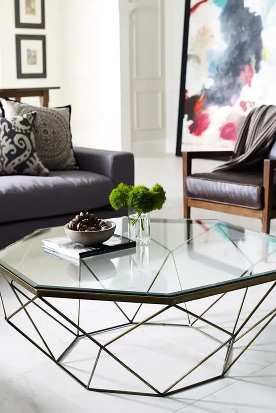 a geometric coffee table with a metal base and a geo glass tabletop will add a modern feel, and geo decor is very popular