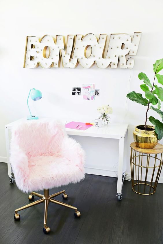 a light pink faux fur chair with brass legs is a great solution for a glam feminine home office