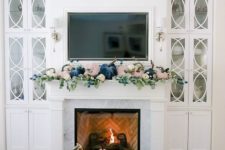 a pastel fall mantel with blush and navy velvet pumpkins and fresh greenery is a cool modern idea