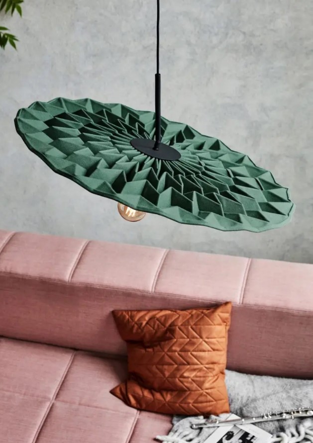 a pendant lamp made of unique wool fiber and features a repetitive geometric pattern to charm and give softness to the space