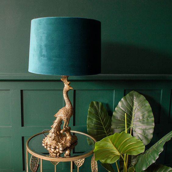 a sophisticated gold peacock and teal velvet lampshade for a refined space and a gorgeous touch to it