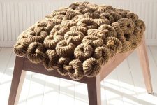 a stool with a unique crochet seat is a cool and cozy idea for any interior, it looks unusual and chic