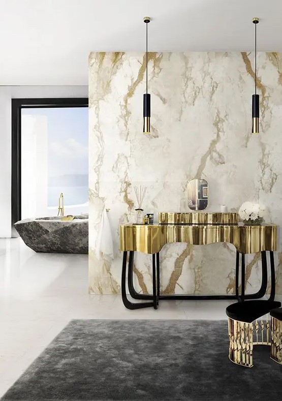 black and gold pendant lamps perfectly match the interior and color scheme and add chic to the bathroom