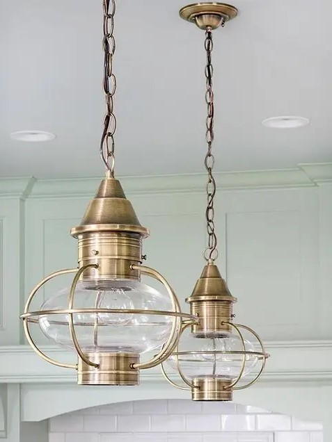 brass pendant lamps with large bubbles and on chain are amazing for a chic and beautiful space with a vintage feel