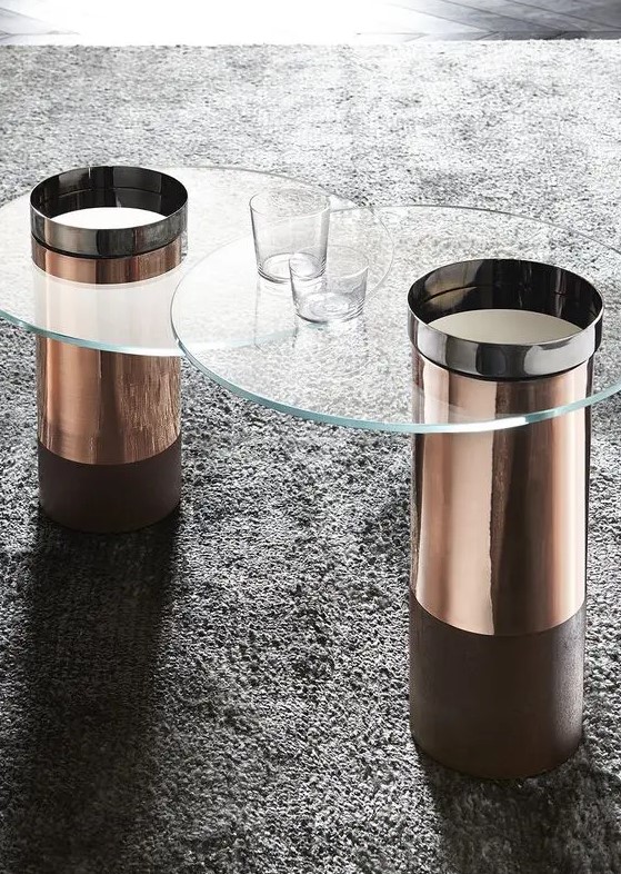 chic round modern coffee tables with copper bases with glass tabletops will spruce up your space